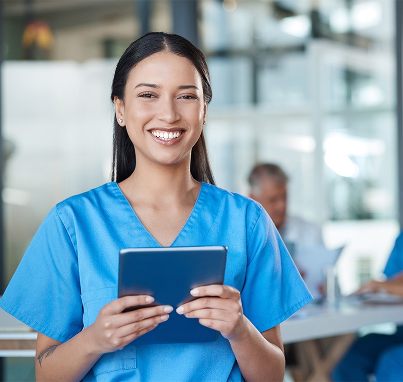 Healthcare professional in scrubs