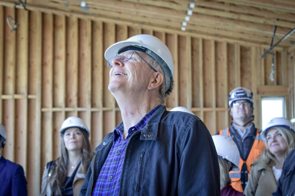 Construction crew wearing matching safety vests