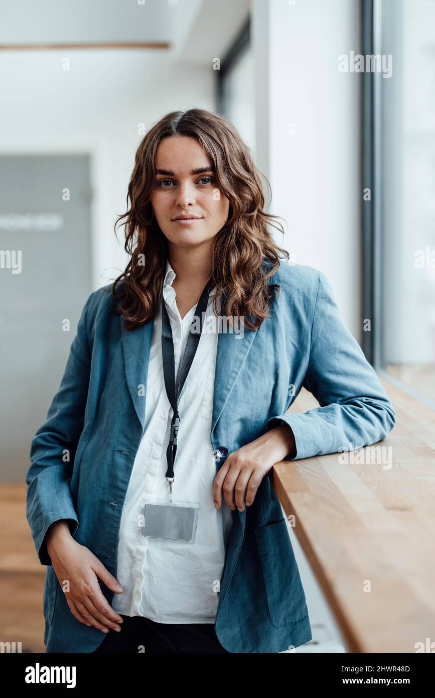 Office worker wearing an ID badge