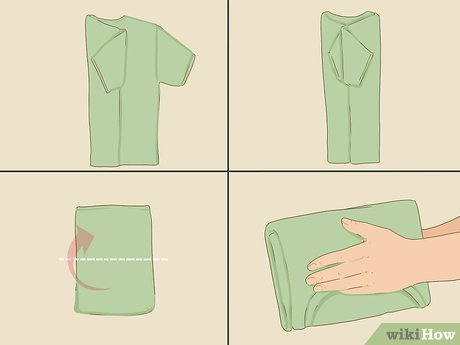 Employee neatly folding a clean uniform shirt