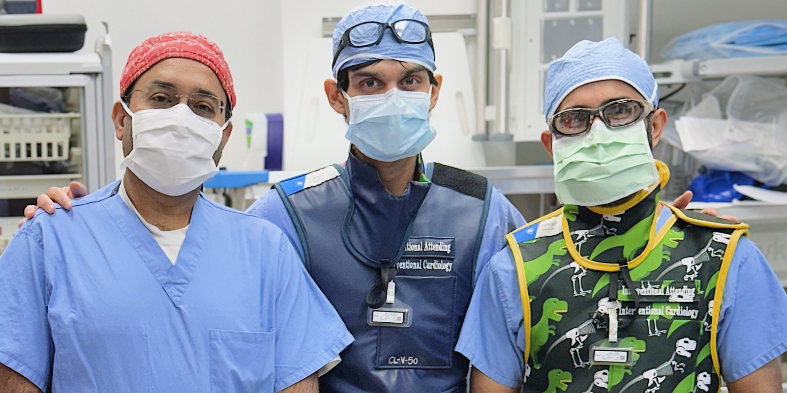 Healthcare team members with different colored scrubs