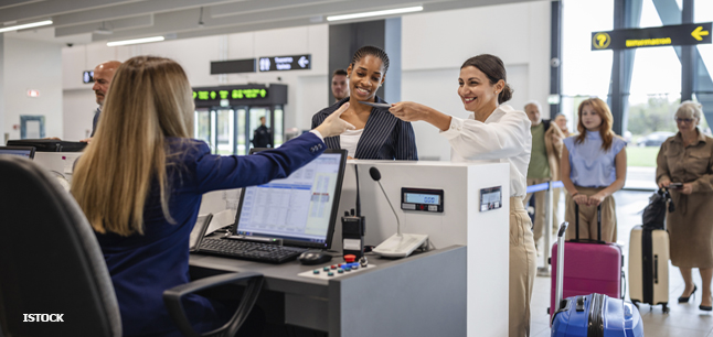 Service staff member assisting a customer Service staff member assisting a customer