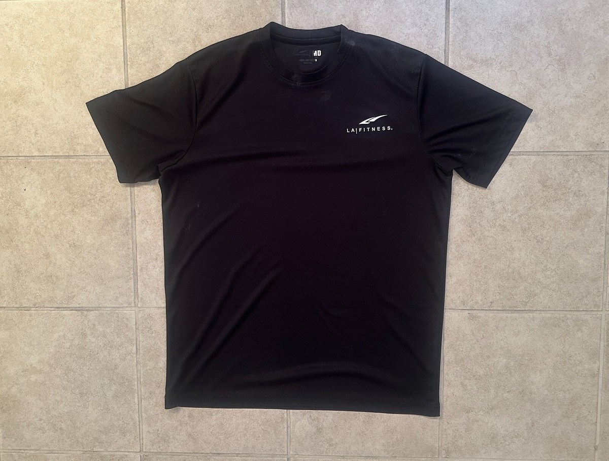 Employee trying on a uniform for fit