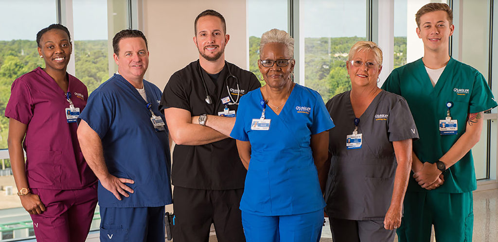 Healthcare worker in scrubs