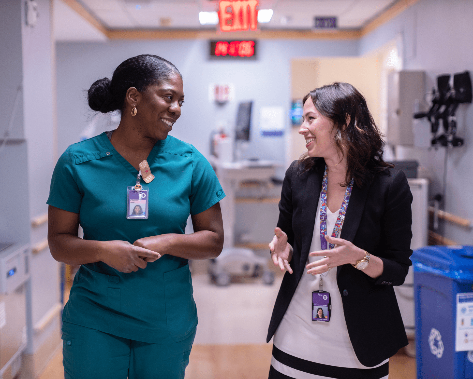 Supervisor discussing uniform policy with employee