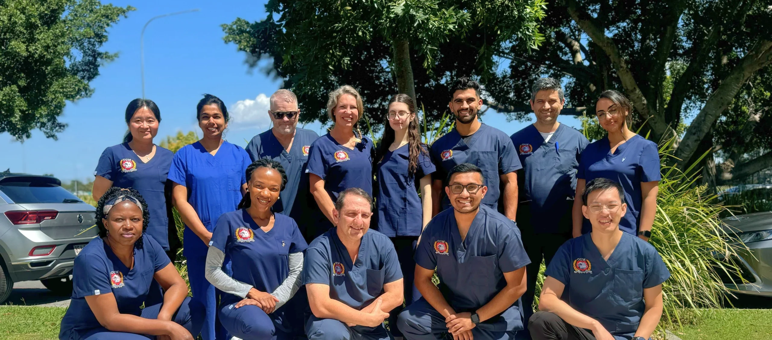 Team of diverse professionals in matching uniforms